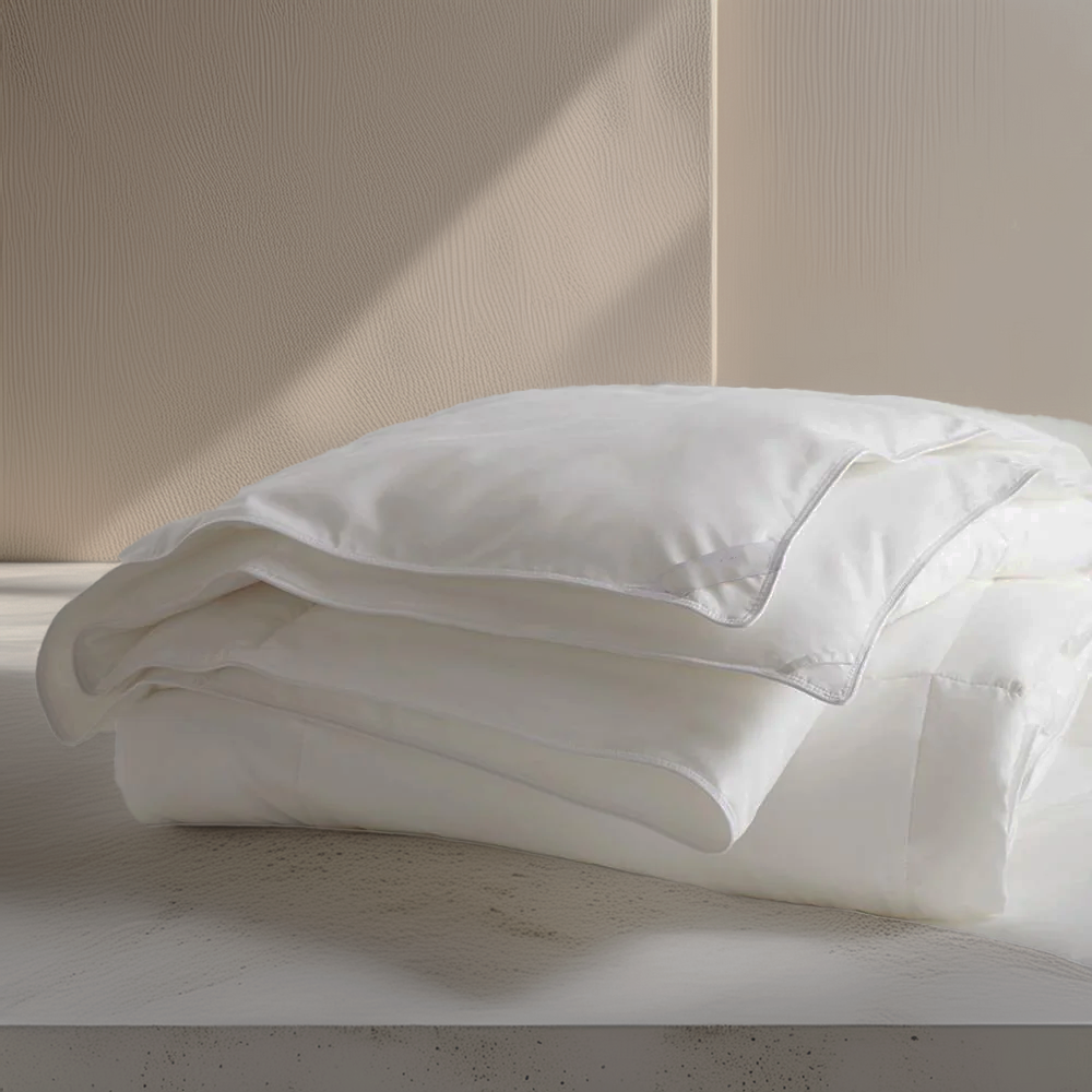Soft white eucalyptus Tencel all weather comforter that is lightweight and silky soft.
