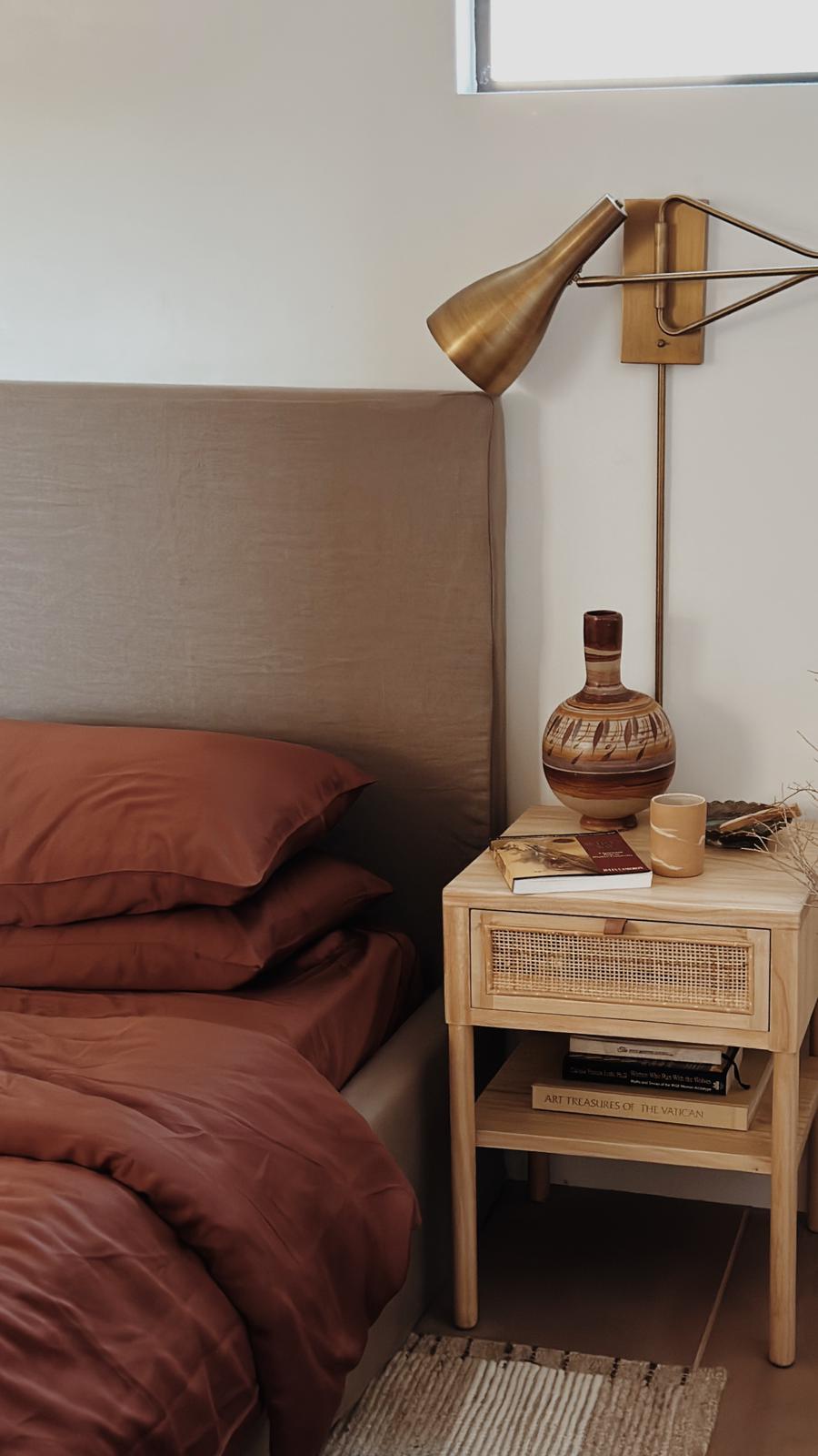 Terracotta eucalyptus sheet set styled in a modern bedroom with breathable, cooling eucalyptus bedding and natural wood accents.