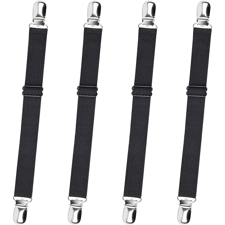 Four black suspenders with silver clips on a white background